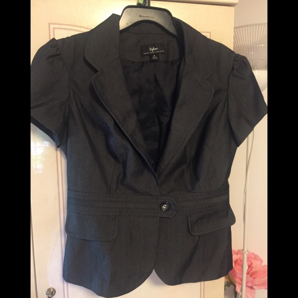 Short one button blazer/jacket.